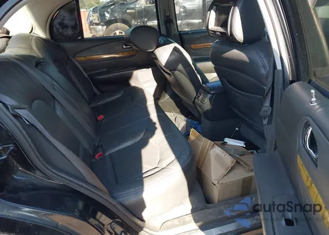 1999 Lincoln Continental z USA, uszkodzony, nr VIN 1LNHM97V7XY609915